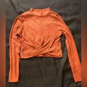It is a set of skirt and blouse.